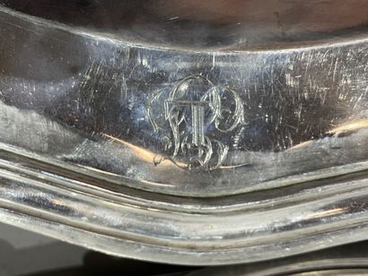 null A silver platerie service in the form of a scalloped edge, engraved LJ, comprising...