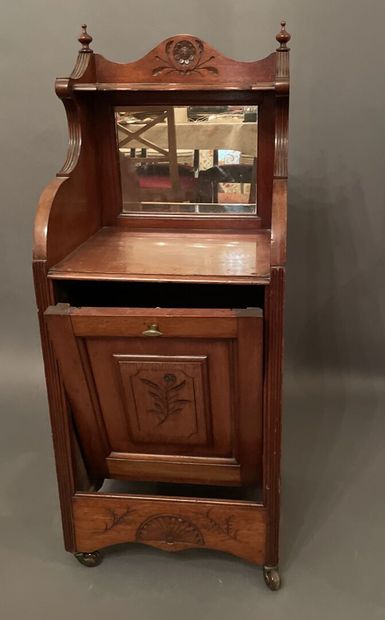 null Telephone table in fruitwood, niche with glass bottom, one flap, castors.
In...