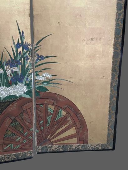 null Three-leaf screen painted with a flowering vase on a wagon on a gold background....