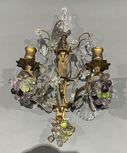 null Pair of gilded metal sconces decorated with bunches of grapes in colored glass...