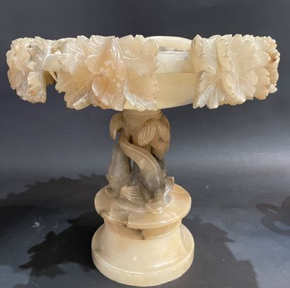 null Two alabaster bowls, one with a snake-shaped handle, the other with a leafy...