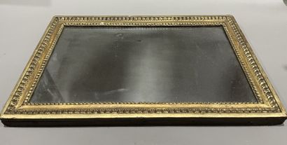 null Rectangular wood and gilded stucco mirror decorated with pearl and laurel leaf...