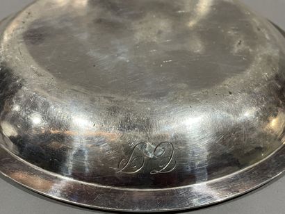 null A plate, a deep dish and a round silver bowl with filet. The bowl, early 19th...