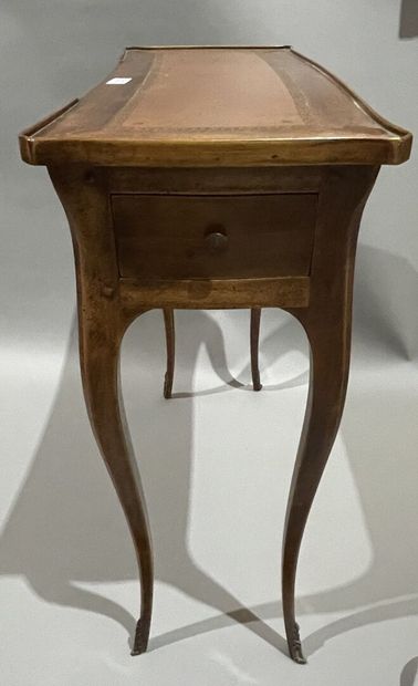 null Stained wood writing table opening to a flap and a side drawer.
Provincial Louis...