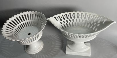 null Two white glazed earthenware openwork bowls, one round, the other navette-shaped.
H:...