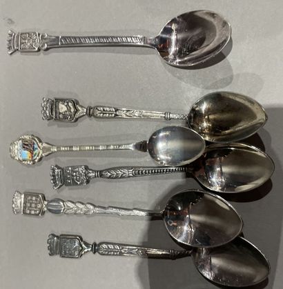 null Twenty-three silver spoons decorated with city escutcheons, some enameled 
and...