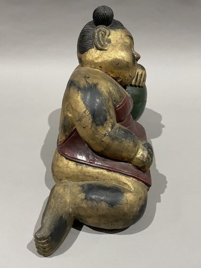 null Sleeping Poussah in polychrome carved wood
China, 20th century.
34 x 48 x 33...