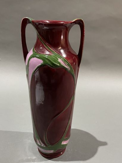 null Large plum slip amphora-shaped vase with plant decoration
Circa 1925
H : 37...