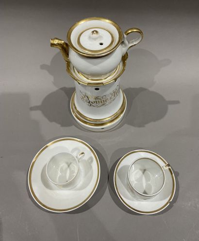 null Teapot and two litron cups and their saucers in gilded porcelain.
One chip
