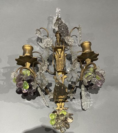 null Pair of gilded metal sconces decorated with bunches of grapes in colored glass...