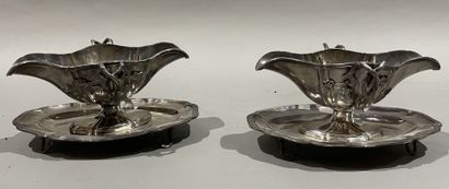null Pair of silver saucers with adhering tray, the handles in vine branches. 
One...