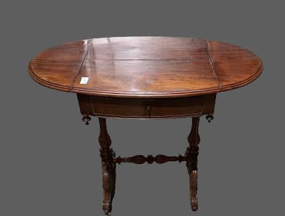 null Small mahogany shutter table, opens with a drawer in the waist, fluted baluster...