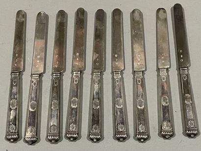 null Nine fruit knives, sheath handle with palmettes, silver blades.
Early 19th century.
Weight...