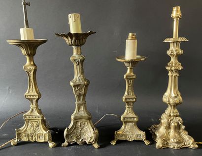 null Four gilt brass candlesticks mounted as lamps
19th century
Height from 41 to...