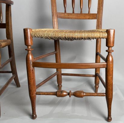 null Armchair and two straw chairs in molded wood, back openwork with colonnettes...