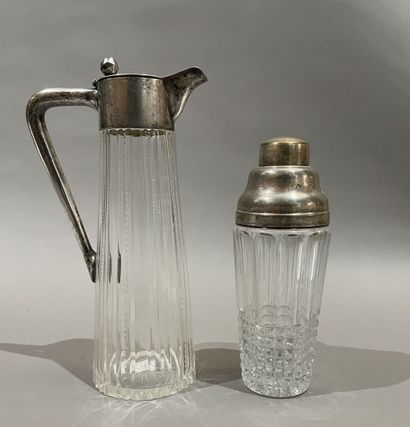 null Cut-glass orangeade jug and shaker mounted in silver-plated metal.