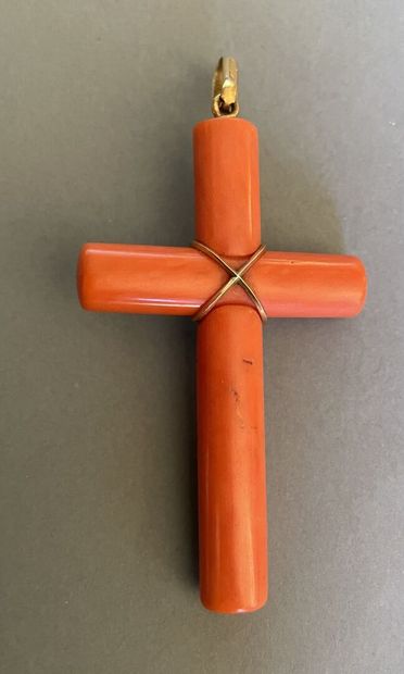 null Orange coral cross embellished with a pearl, mounted as a gold pendant. 
Signed...