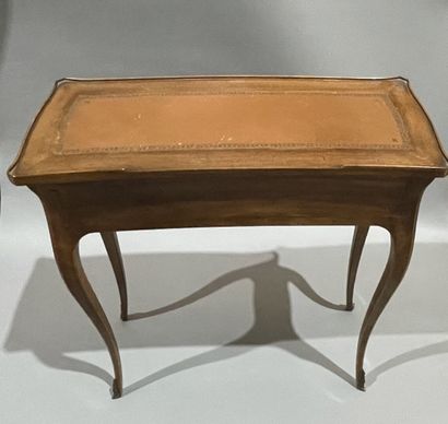 null Stained wood writing table opening to a flap and a side drawer.
Provincial Louis...