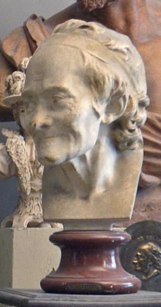 D'après HOUDON Buste de Voltaire Tirage en plâtre, h.: 37 cm