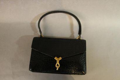 HERMES Un sac «Cordeau» à deux soufflets en croco noir. L: 25 cm