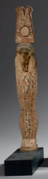  Osiris coiffé des deux plumes d'autruche et portant la barbe postiche. Il est inscrit...