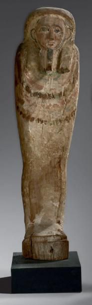  Ptah Sokar Osiris portant la barbe postiche et un large collier ousekh peint. Bois,...
