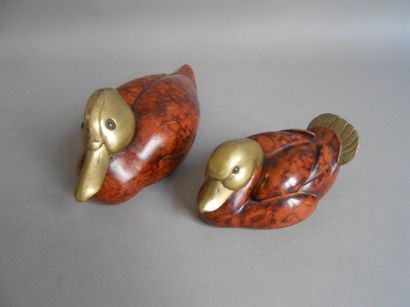 Deux canards en bois et bronze doré.

L :...