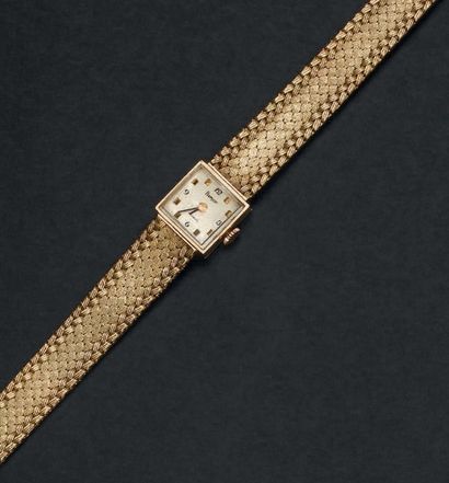 FLAMOR Montre bracelet de dame en or jaune 18K (750°/00). Le boîtier carré.
Le cadran...