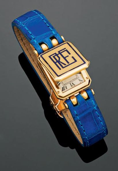 CARTIER Montre bracelet rectangulaire «savonnette» mixte en or jaune 18K (750°/00),...