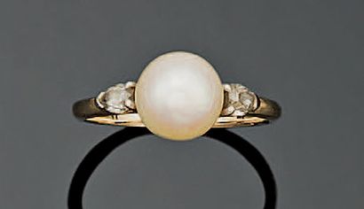 null Bague en or blanc 18K (750°/00) et platine (950°/00) sertie d'une perle de culture...