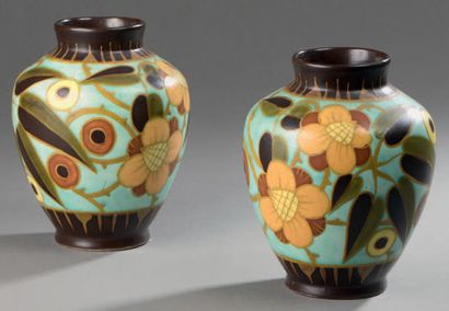 KERAMIS 
Deux vases au modèle en céramique à corps ovoïde épaulé et col annulaire...