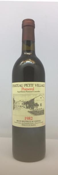 null 1 Bouteille Château Petit Village, 1982