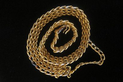 null Anonyme : Lot composé d'un collier en métal doré godronné, articulé, rehaussé...