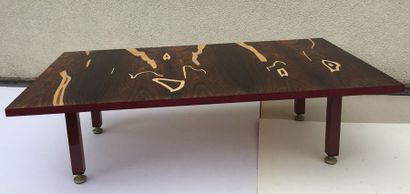 null Arlette MARTIN (née en 1924)

Table en marqueterie de bois exotiques.

23 x...