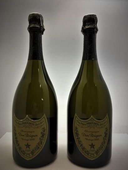 null 2 bouteilles de Dom Pérignon Millésime 2002.
Très légers accrocs sur étiquettes...