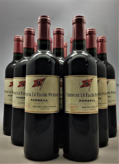 null 12 bouteilles de Château La Fleur-Pétrus Pomerol 2007, en caisse bois d'origine.
3...