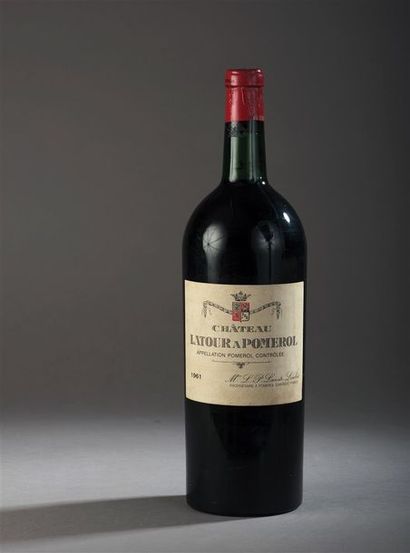 null 1 magnum de Château Latour à Pomerol Pomerol 1961.
Base goulot, étiquette très...