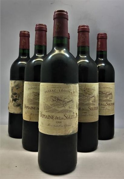 null 6 bouteilles du Domaine de la Solitude Pessac-Léognan 1998.
Étiquettes sales,...