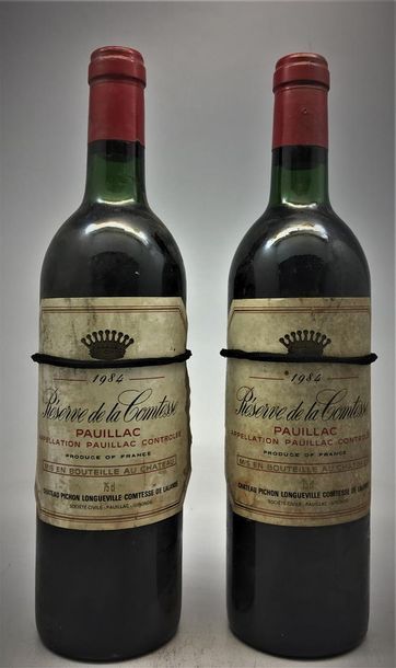 null 2 bouteilles de Réserve de la Comtesse Pauillac 1984.
2 base goulot, étiquettes...
