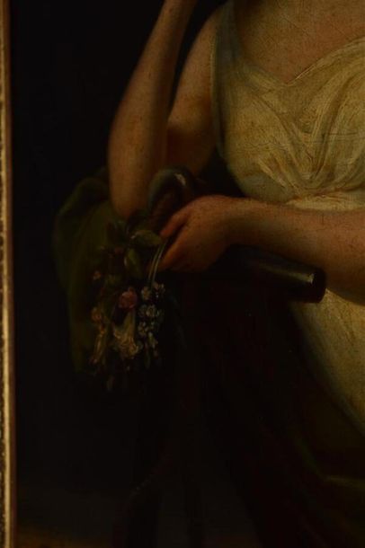  Ecole Romantique "Jeune femme aux fleurs" huile sur toile, porte une trace de monogramme...