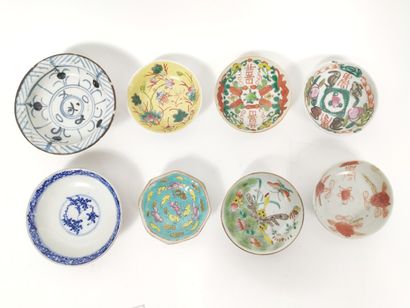 Set of eight small mismatched bowls, with...