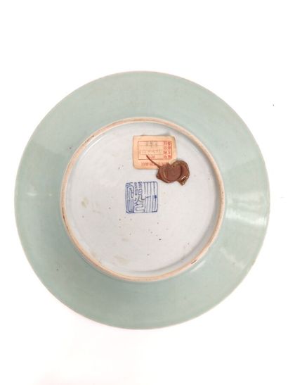  Celadon glazed stoneware circular dish 
On the back: Daoguang apocryphal mark and...