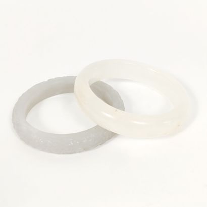 CHINA, Modern 
Set of two nice jadeite bracelets,...