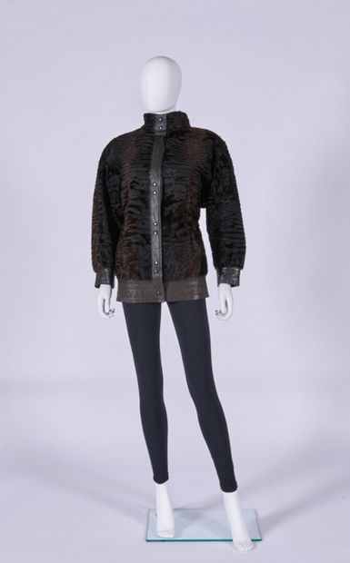  A L'HERMINE ROYAL - 1980s 
3/4 length jacket in brindle breitschwanz and ebony leather,...