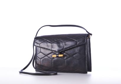 CHRISTIAN DIOR BOUTIQUE 
Black quilted leather...