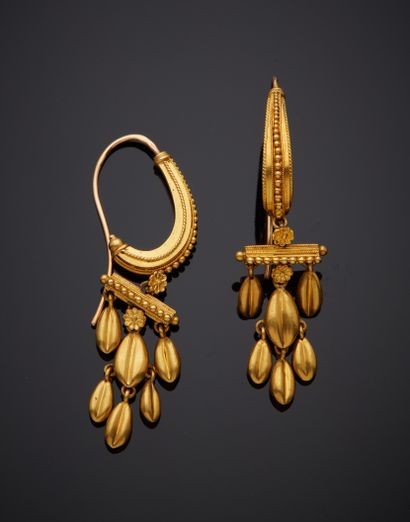  Pair of yellow gold (750‰) "sleeper" EARRINGS, finely beaded and twisted, each holding...