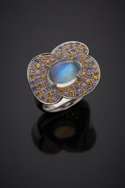  Important white gold (750‰) "stylized flower" signet ring set with an oval cabochon...