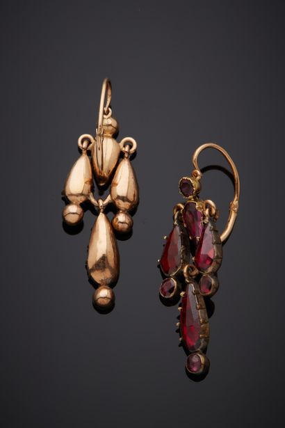  Pair of pink gold (750‰) "dormeuses" EARRINGS holding eight round pear-shaped faceted...