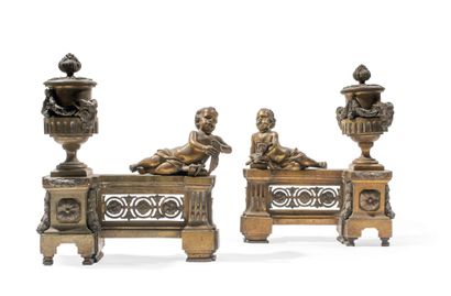  Pair of andirons and bronze with vases in relief with heads of ibexes and elongated...