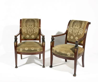  A pair of mahogany and mahogany veneered armchairs with reversed backs ; armrests...
